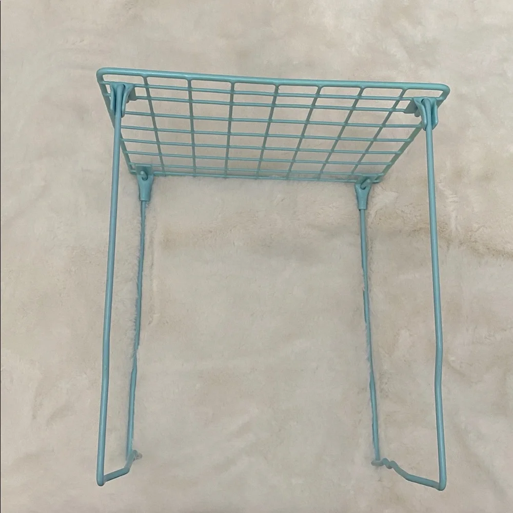 Aqua Metal Grid Locker Shelf. Folds Up For Storage